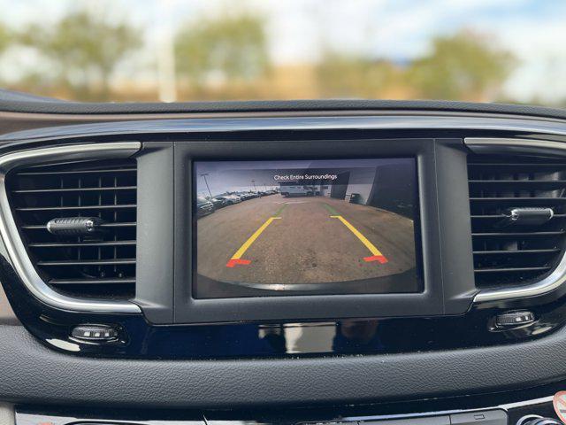 used 2023 Chrysler Voyager car, priced at $22,400