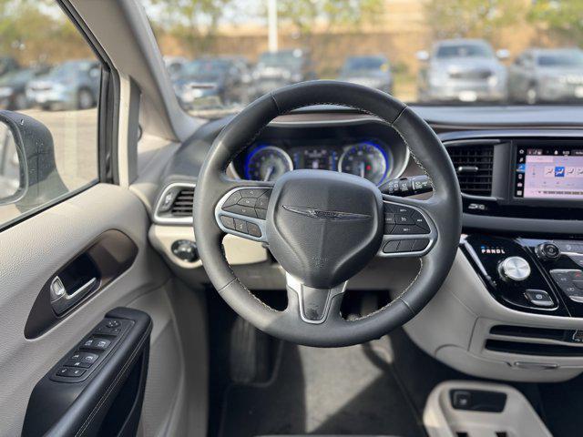 used 2023 Chrysler Voyager car, priced at $22,400