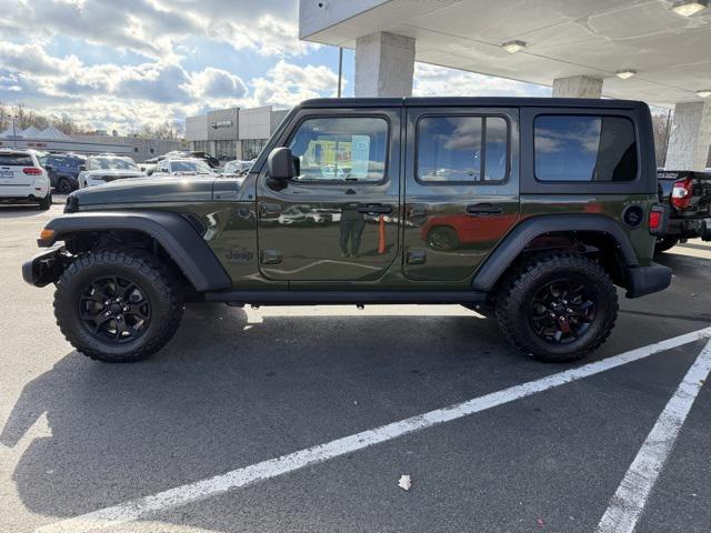 used 2021 Jeep Wrangler Unlimited car, priced at $31,436