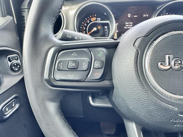 used 2023 Jeep Wrangler car, priced at $34,802