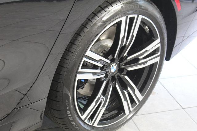 new 2025 BMW 740 car, priced at $104,635
