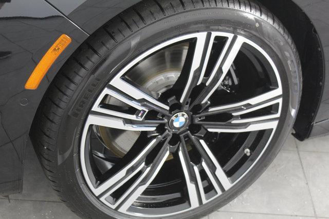 new 2025 BMW 740 car, priced at $104,635