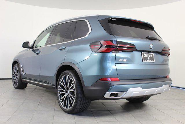 used 2026 BMW X5 car, priced at $72,997