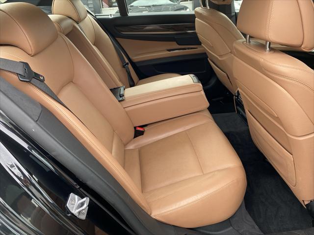 used 2015 BMW 750 car, priced at $21,750