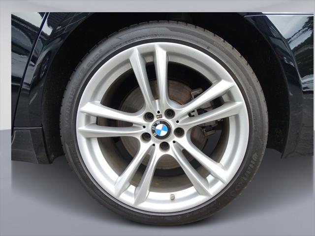 used 2015 BMW 740 car, priced at $18,995