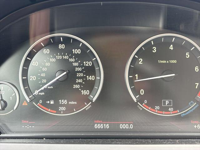 used 2012 BMW 750 car, priced at $17,495