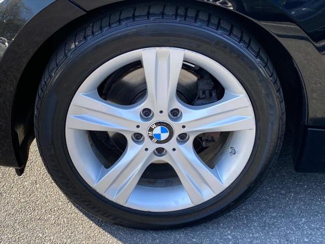 used 2012 BMW 128 car, priced at $10,995