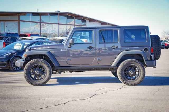 used 2014 Jeep Wrangler Unlimited car, priced at $21,232