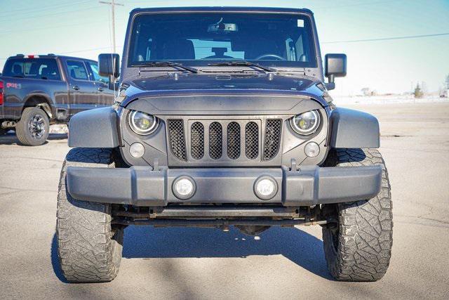 used 2014 Jeep Wrangler Unlimited car, priced at $21,232