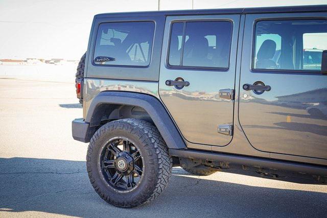 used 2014 Jeep Wrangler Unlimited car, priced at $21,232