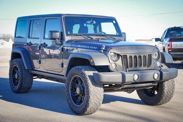 used 2014 Jeep Wrangler Unlimited car, priced at $21,232