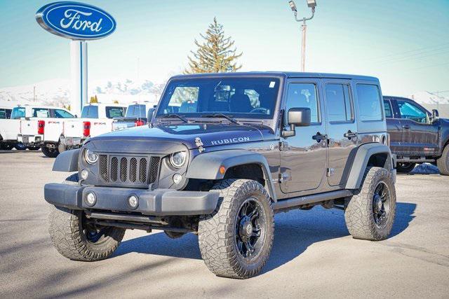 used 2014 Jeep Wrangler Unlimited car, priced at $21,232