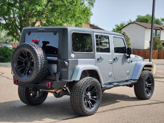 used 2014 Jeep Wrangler Unlimited car, priced at $16,999