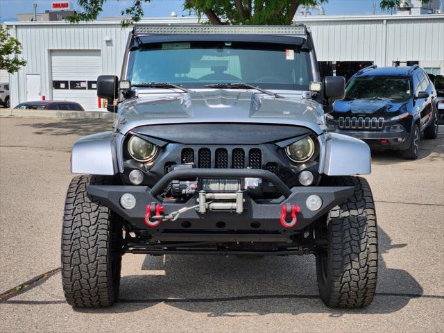 used 2014 Jeep Wrangler Unlimited car, priced at $16,999