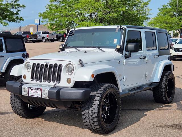 used 2012 Jeep Wrangler Unlimited car, priced at $16,999