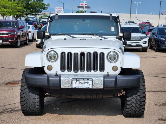 used 2012 Jeep Wrangler Unlimited car, priced at $16,999