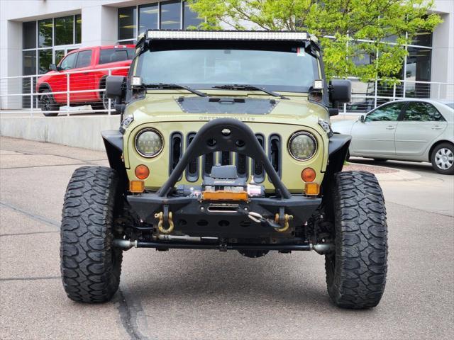 used 2013 Jeep Wrangler Unlimited car, priced at $19,899