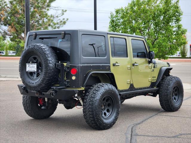 used 2013 Jeep Wrangler Unlimited car, priced at $19,899