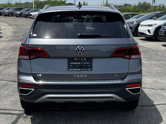 new 2024 Volkswagen Taos car, priced at $27,882