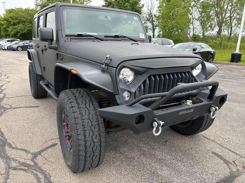 used 2014 Jeep Wrangler Unlimited car, priced at $18,727