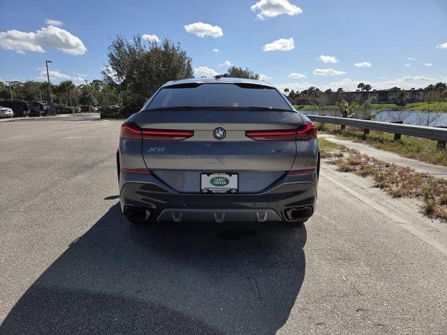 used 2025 BMW X6 car, priced at $77,779