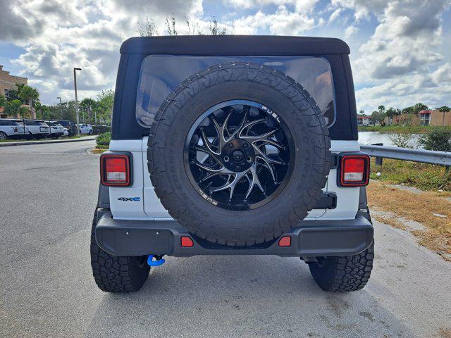 used 2023 Jeep Wrangler 4xe car, priced at $38,779