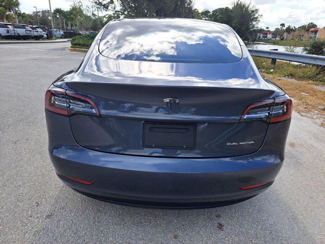 used 2022 Tesla Model 3 car, priced at $24,999