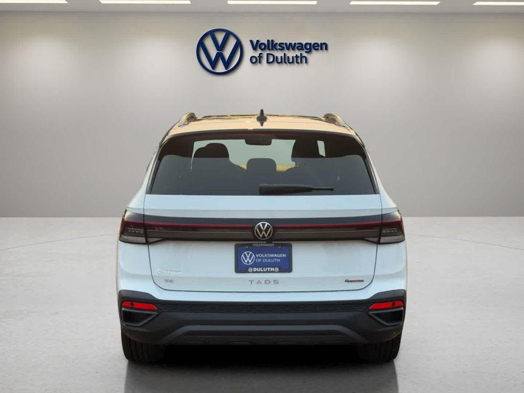 new 2025 Volkswagen Taos car, priced at $33,096