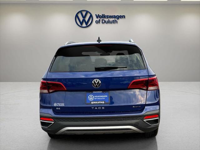 new 2024 Volkswagen Taos car, priced at $32,021