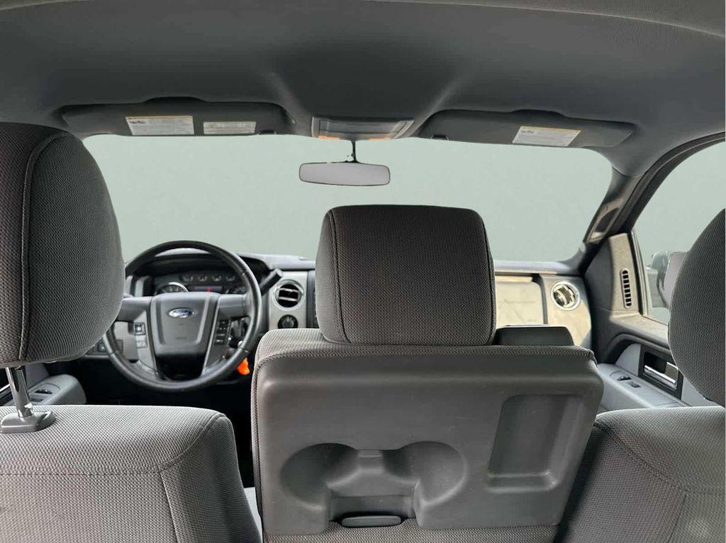 used 2014 Ford F-150 car, priced at $15,000