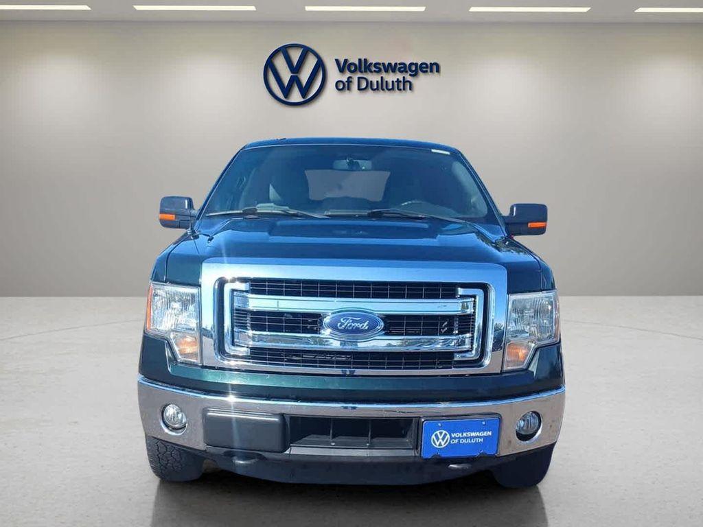 used 2014 Ford F-150 car, priced at $15,000