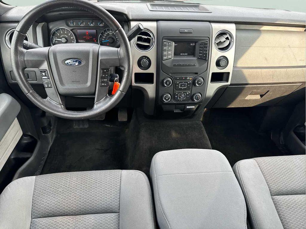 used 2014 Ford F-150 car, priced at $15,000