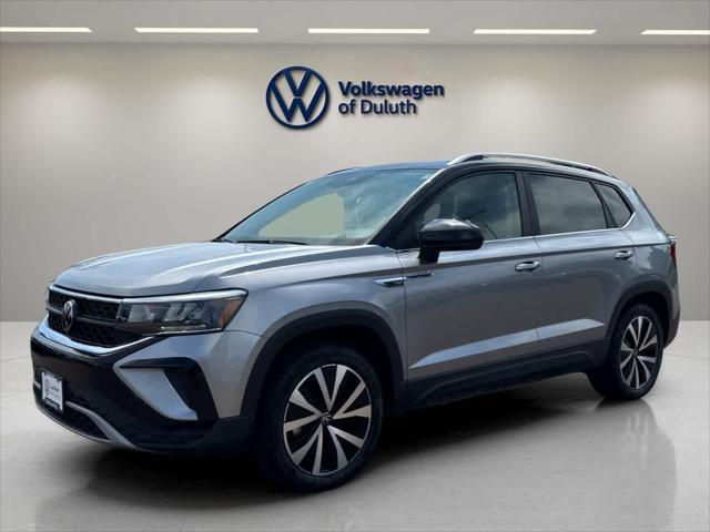 used 2023 Volkswagen Taos car, priced at $25,000