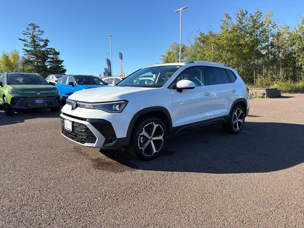 used 2025 Volkswagen Taos car, priced at $32,999