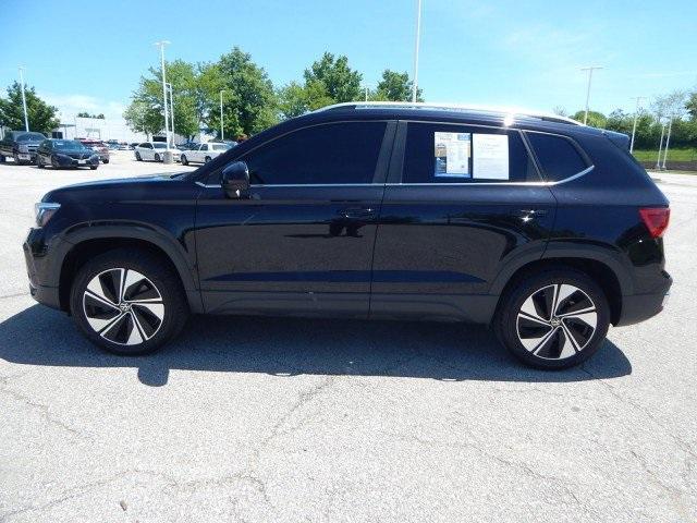 used 2023 Volkswagen Taos car, priced at $23,300