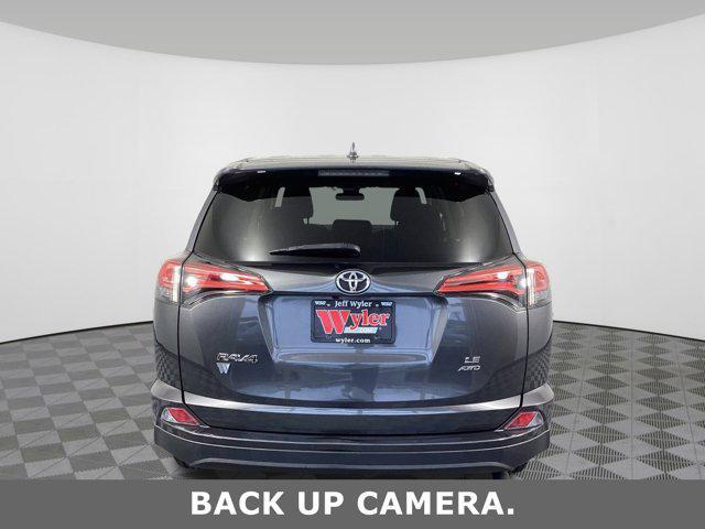 used 2018 Toyota RAV4 car, priced at $17,526