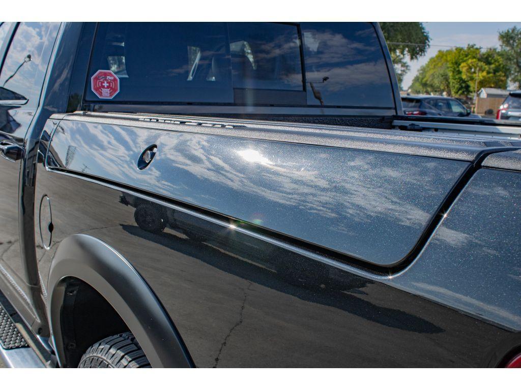 used 2018 Ram 1500 car, priced at $22,998