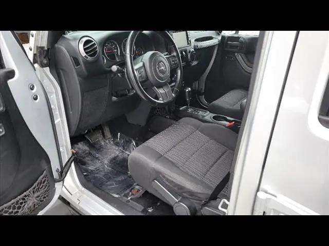 used 2012 Jeep Wrangler Unlimited car, priced at $14,995