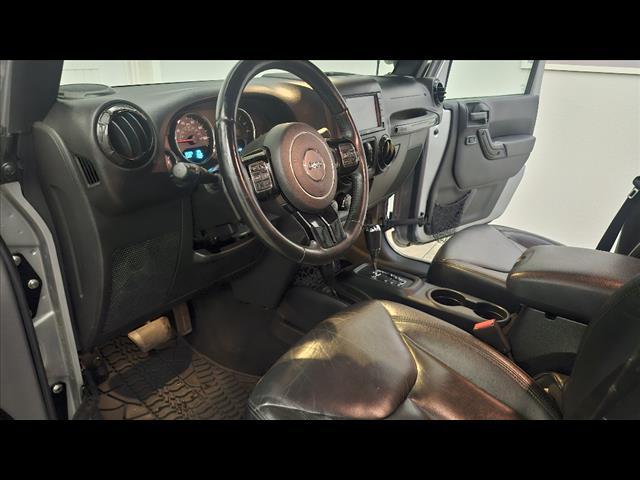 used 2015 Jeep Wrangler Unlimited car, priced at $13,895