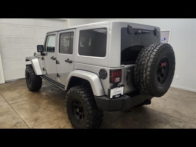 used 2015 Jeep Wrangler Unlimited car, priced at $13,895