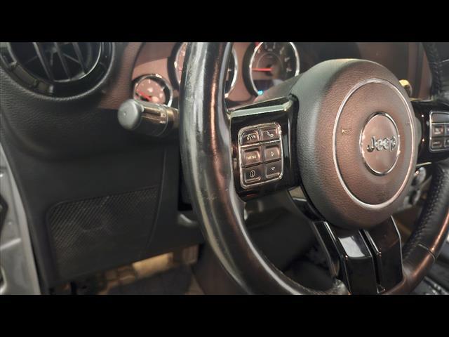 used 2015 Jeep Wrangler Unlimited car, priced at $13,895