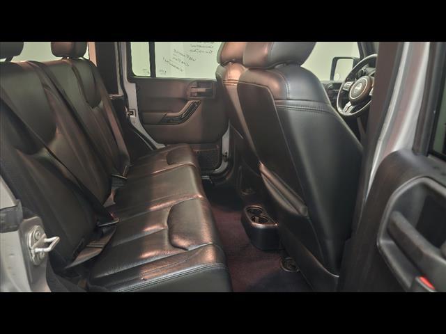 used 2015 Jeep Wrangler Unlimited car, priced at $13,895