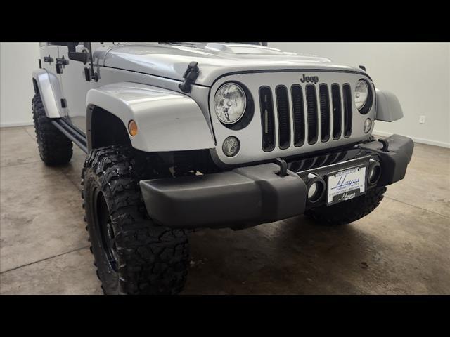 used 2015 Jeep Wrangler Unlimited car, priced at $13,895