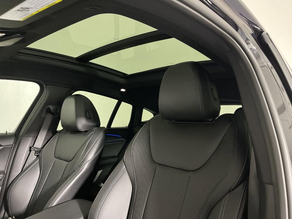 new 2025 BMW X4 car, priced at $64,745