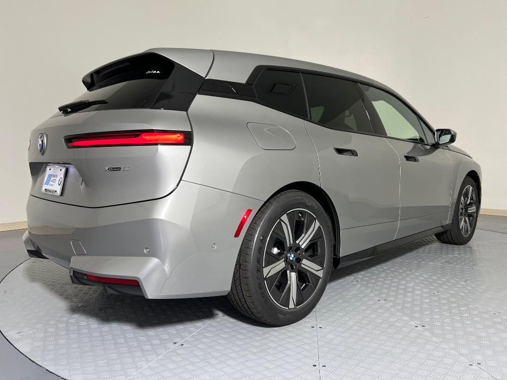 new 2026 BMW iX car, priced at $101,170