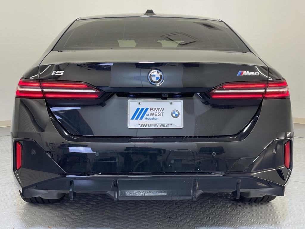 used 2024 BMW i5 car, priced at $65,557