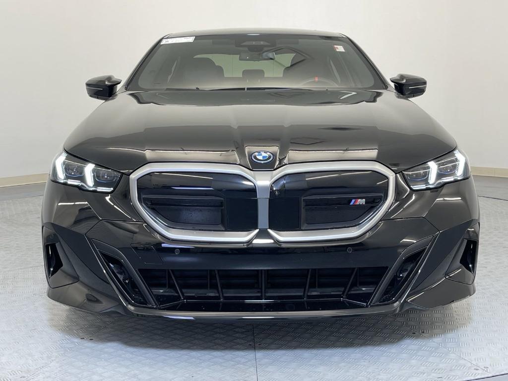 used 2024 BMW i5 car, priced at $65,557