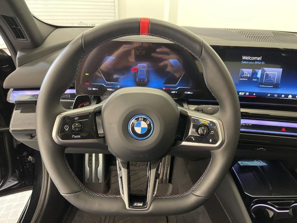 used 2024 BMW i5 car, priced at $65,557