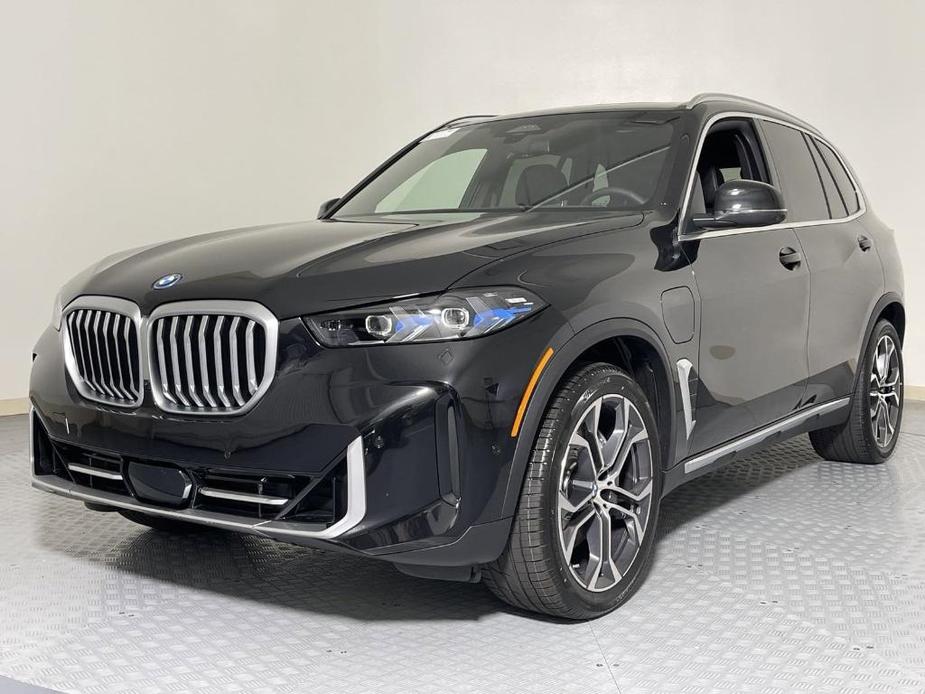 new 2025 BMW X5 PHEV car, priced at $82,140