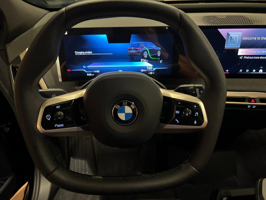 new 2026 BMW iX car, priced at $83,945